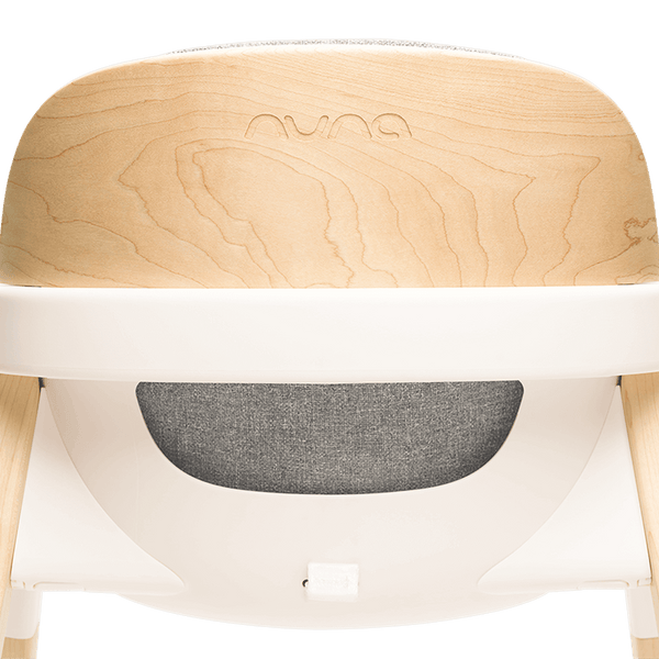 Nuna BRYN highchair with light maple wood top white plastic frame and gray fabric seat in modern design heritage bundle