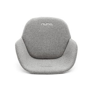 Gray textured fabric baby seat with white embroidered logo in nuna bryn highchair and newborn rocker bundle heritage