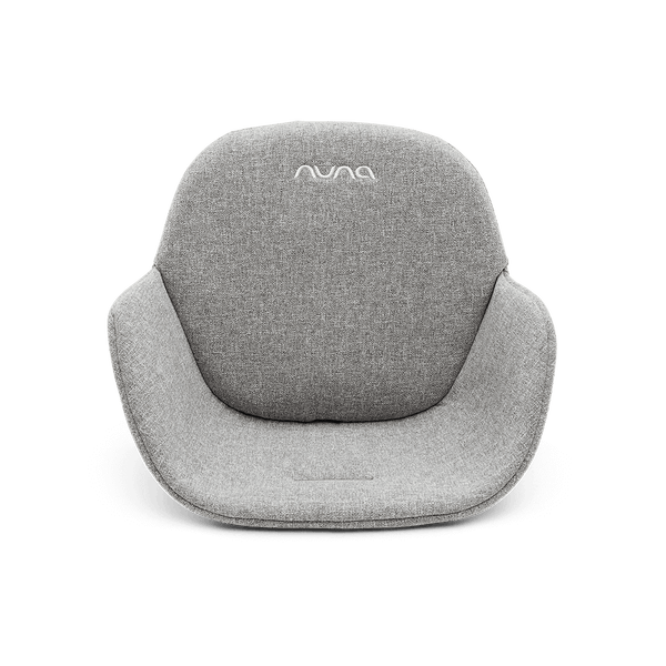 Gray textured fabric baby seat with white embroidered logo in nuna bryn highchair and newborn rocker bundle heritage