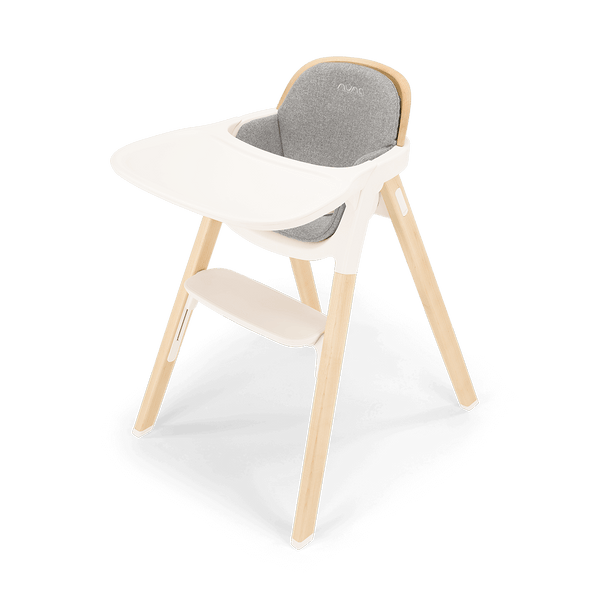 Nuna BRYN highchair with white plastic tray light wood frame and gray cushioned seat with oeuf logo