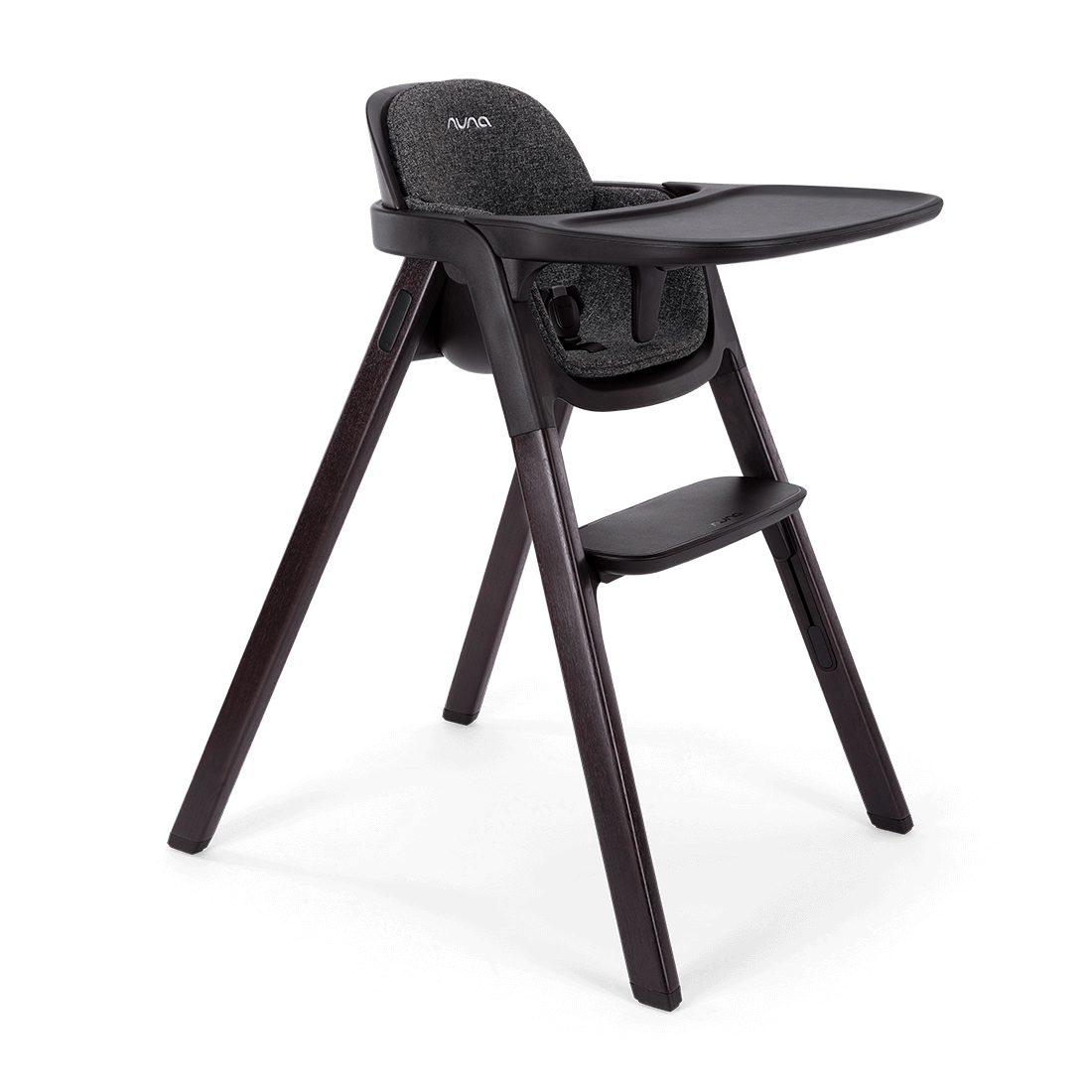 Black Nuna BRYN highchair Metro with textured fabric seat and sleek dark wooden legs for stylish dining seating