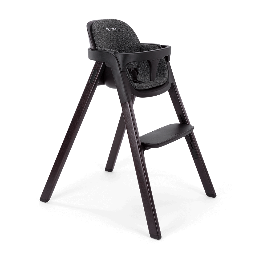 Black Nuna BRYN highchair with textured fabric seat and sleek wooden legs for stylish dining comfort