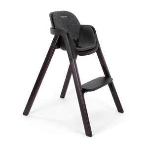 Nuna BRYN highchair metro dark gray textured fabric with sleek wooden legs minimalist design back view with logo