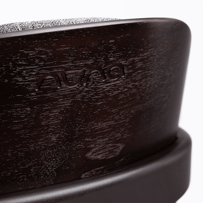 Dark wood-finish nuna bryn highchair metro with textured gray fabric top baby car seat base shown from back side