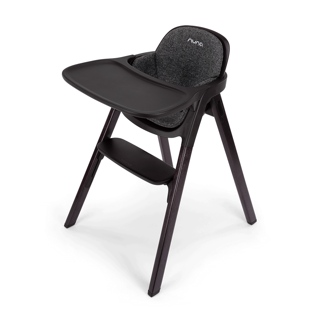 Black nuna bryn highchair metro with textured gray fabric seat and tray for comfortable baby seating