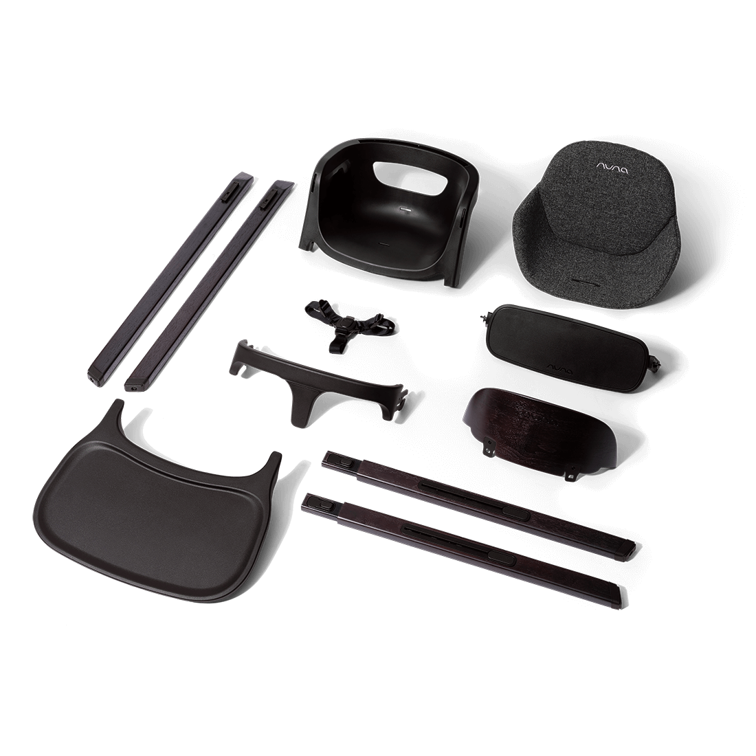 Black plastic and fabric components of a nuna bryn highchair metro baby car seat assembly showing the back side