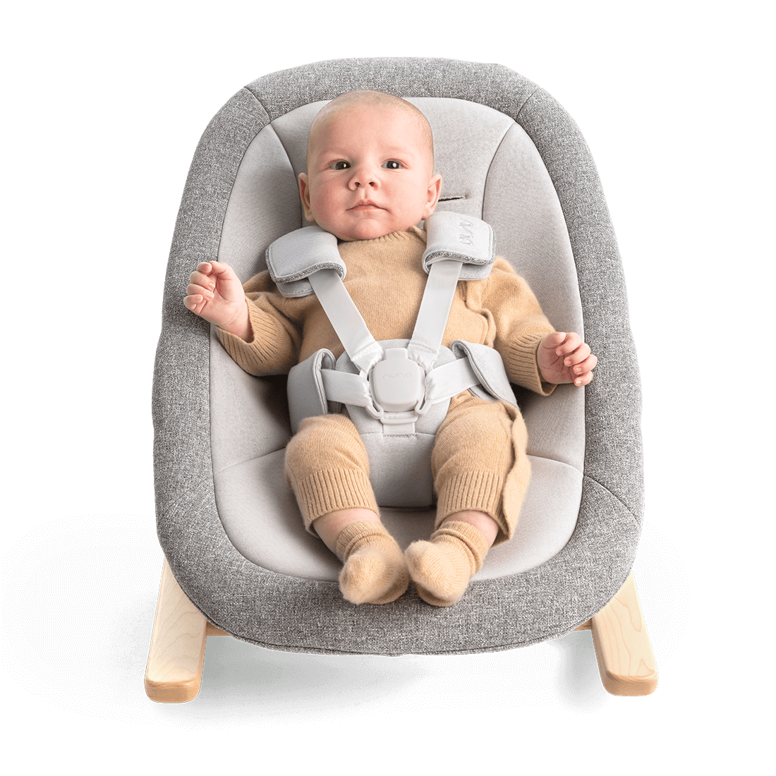 Gray textured fabric nuna bryn newborn rocker with light wood legs and adjustable safety straps for infants