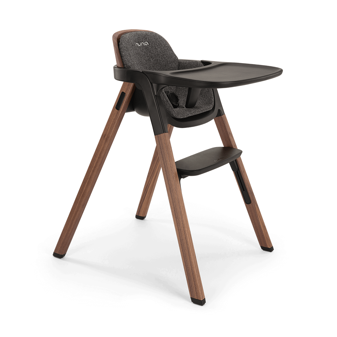 Modern wooden-legged Nuna BRYN highchair with dark gray upholstered seat and tray in Sanderson finish