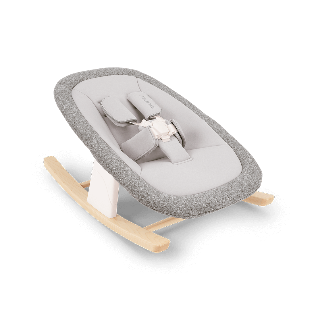 Gray textured fabric baby rocker with light wood base and white plastic support nuna bryn newborn rocker heritage
