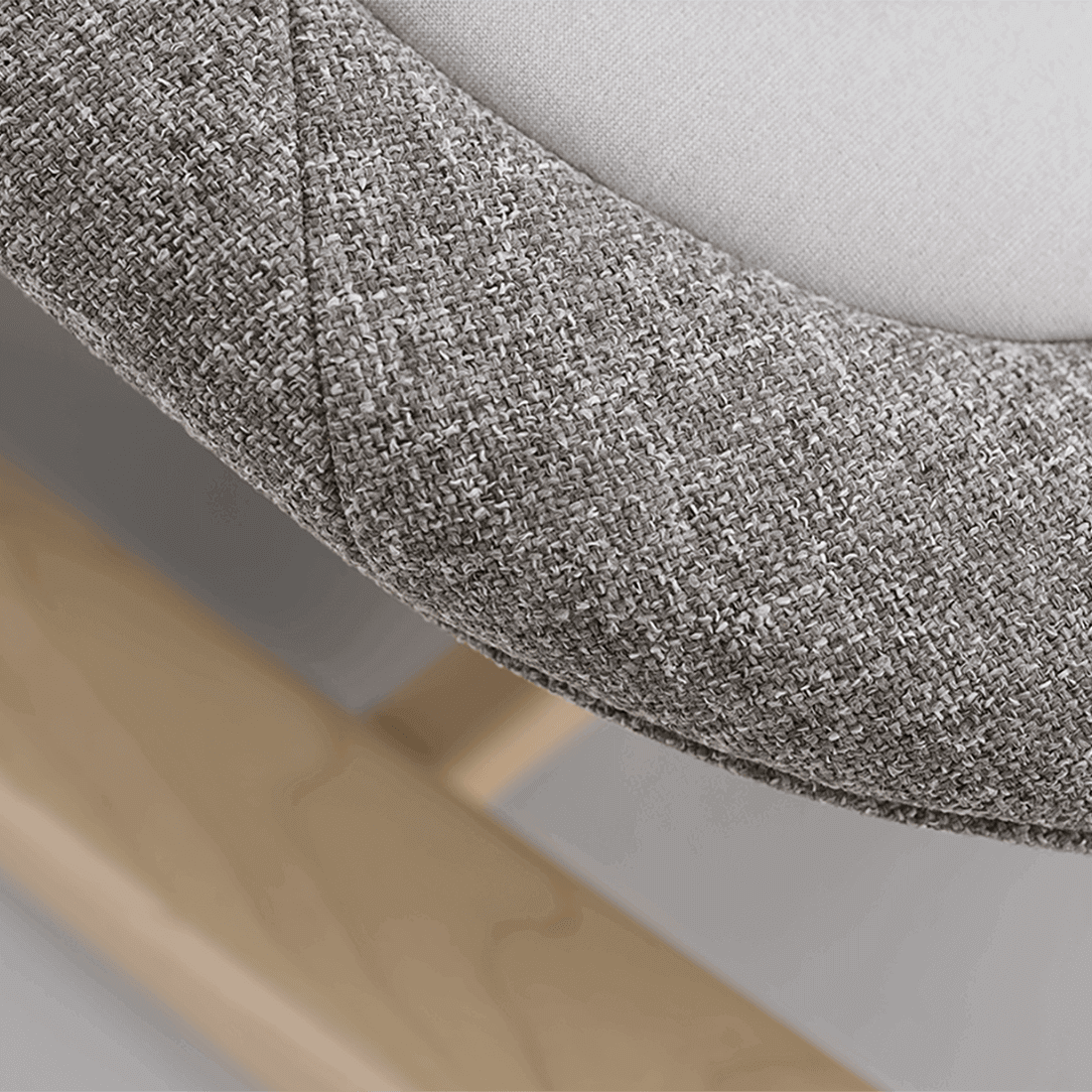 Gray textured fabric chair cushion with soft woven surface for nuna bryn newborn rocker heritage model