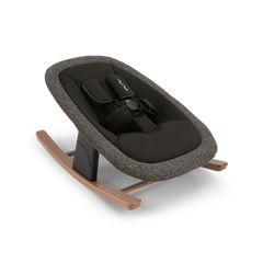 Modern black and gray textured fabric Nuna BRYN newborn rocker with wooden rockers in Sanderson design