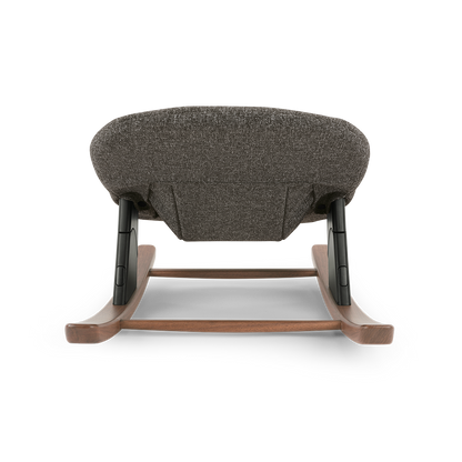 Nuna BRYN newborn rocker in sanderson gray textured fabric with wooden rockers and black metal supports