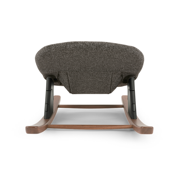 Nuna BRYN newborn rocker in sanderson gray textured fabric with wooden rockers and black metal supports