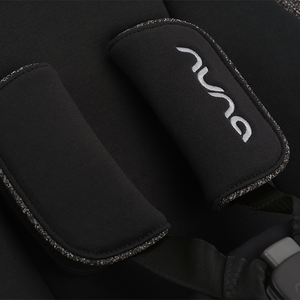 Black neoprene padded shoulder strap with silver embroidered Nuna logo and textured edge trim for Nuna BRYN newborn rocker