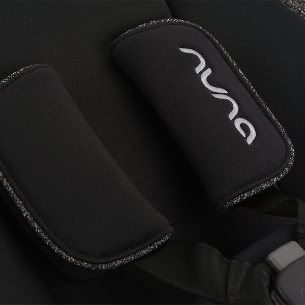 Black neoprene padded shoulder strap with silver embroidered Nuna logo and textured edge trim for Nuna BRYN newborn rocker