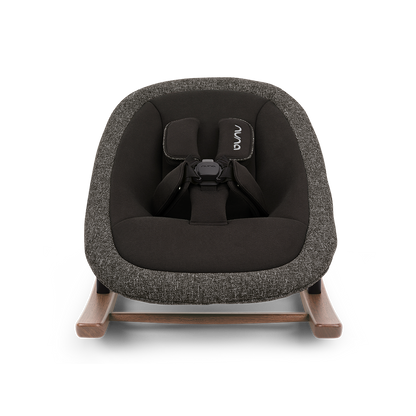Nuna BRYN newborn rocker in sanderson with charcoal gray textured fabric and light wood tone rockers