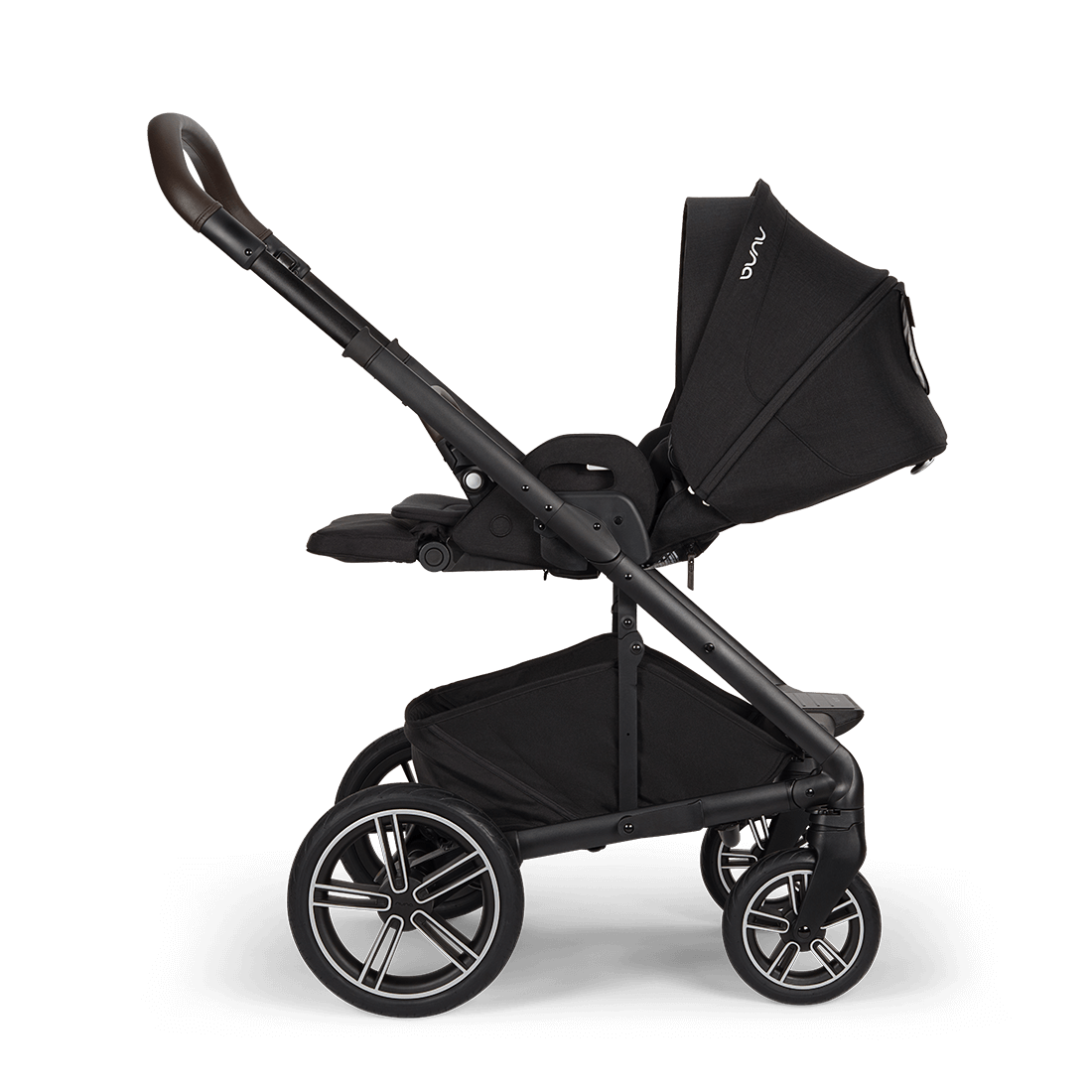 Nuna mixx next stroller in caviar black with sleek frame brown leather handle and silver accented wheels shown from back side