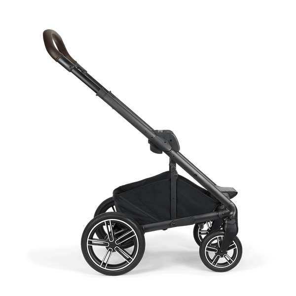 Black Nuna MIXX NEXT stroller with sleek frame brown leather handle and silver accented wheels shown from the back side
