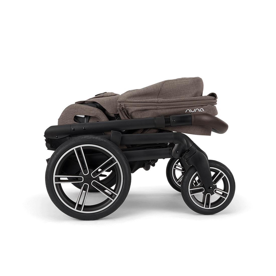 Nuna mixx next stroller in chestnut brown fabric with black frame and silver accented wheels featuring sleek design