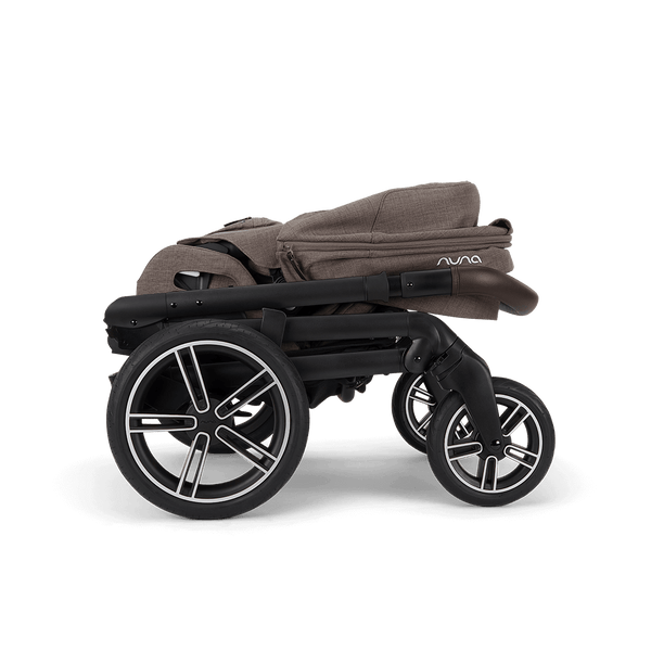Nuna mixx next stroller in chestnut brown fabric with black frame and silver accented wheels featuring sleek design