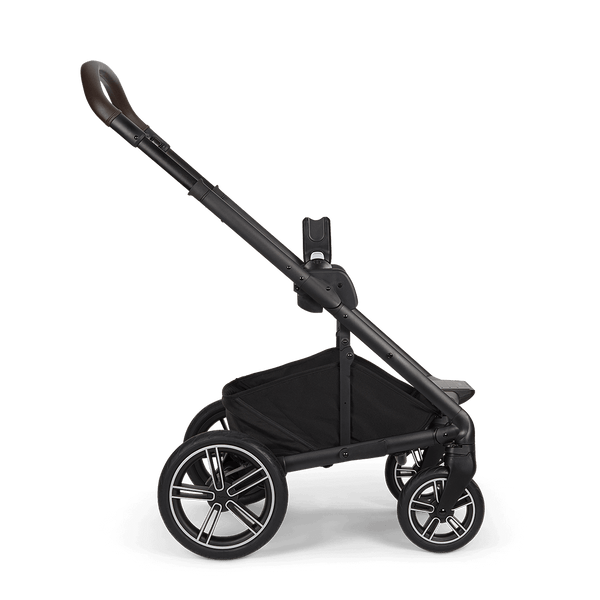 Black Nuna MIXX NEXT stroller with sleek modern design and matte-finished frame shown from the back side