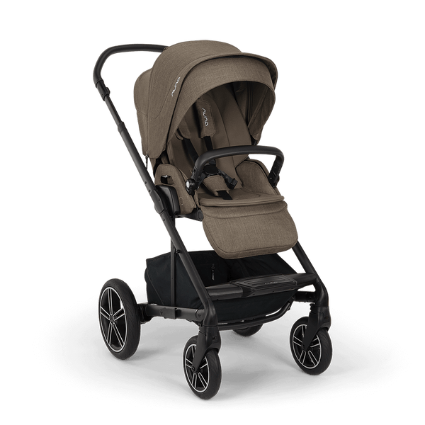 Nuna mixx next stroller in pistachio with tan fabric seat and sleek black metal frame and wheels