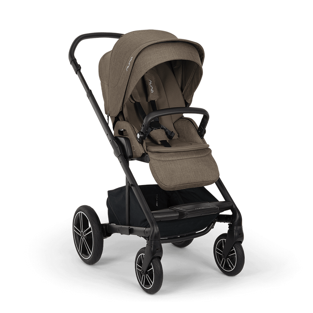 Nuna mixx next stroller in pistachio with tan fabric seat and sleek black metal frame and wheels