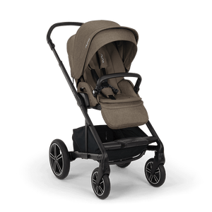 Nuna MIXX NEXT stroller in tan fabric with black metal frame and wheels featuring a sleek modern design