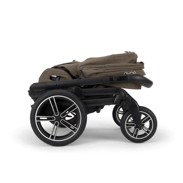 Brown fabric nuna mixx next stroller with black frame and silver accented wheels shown from the back side