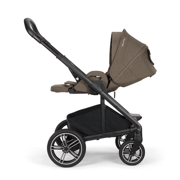 Brown fabric canopy with subtle stitching and white logo on black metal frame Nuna MIXX NEXT stroller pistachio