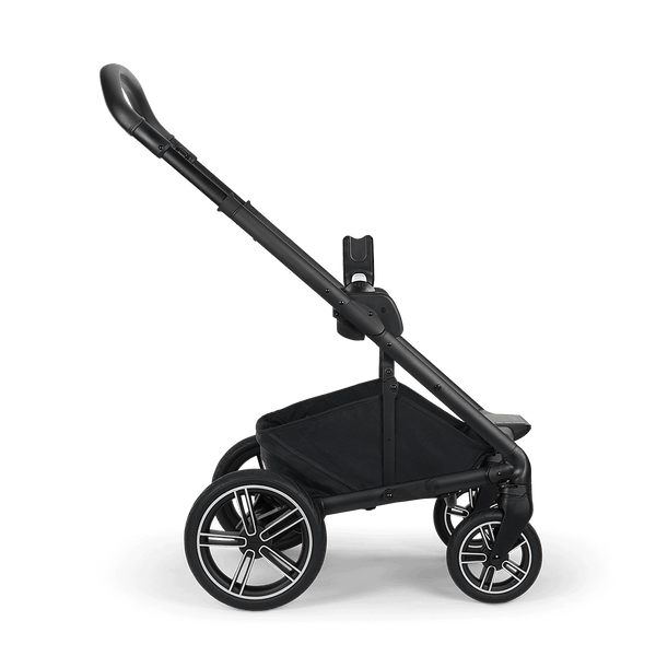 Black nuna mixx next stroller with sleek modern design and silver accented wheels shown from the back side
