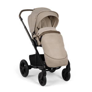 Beige quilted nuna mixx next stroller with black frame and wheels for comfortable urban mobility