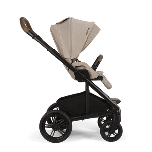 Beige and black nuna mixx next stroller cosmpolitan with sleek design soft fabric upholstery and sturdy alloy wheels