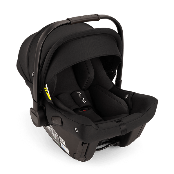 Black nuna PIPA urbn infant car seat with baseless ISOFIX, sleek modern design, and soft fabric interior for newborns