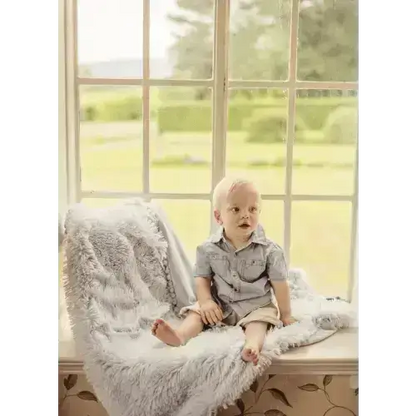 Bizzi Growin Pom Pom blanket in Blue