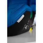 Close-up of Calm Blue seat stitching, the AXION 1 label and black base.