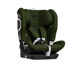 Recaro VELIX 1 in Epic Green, angled front view showing padded harness, central buckle and adjustment strap.