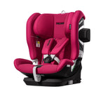 Recaro VELIX 1 in Wow Pink, angled front view with padded harness and a black attachment on the outer side wing.