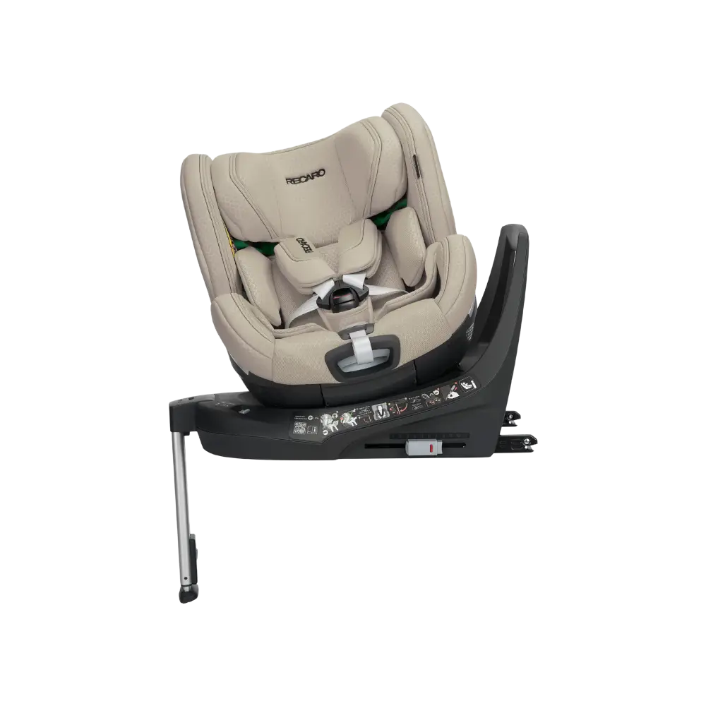 Elegant Beige XENON 1 KID, rotated on its black base with padded harness and extended silver support leg.